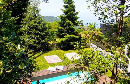 Anilio Villa | Golden Mountain in Pelion has an outdoor swimming pool, garden and mountain view