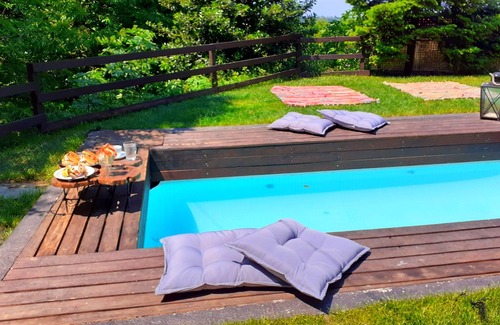 Anilio Villa | Golden Mountain in Pelion has an outdoor swimming pool, garden and mountain view