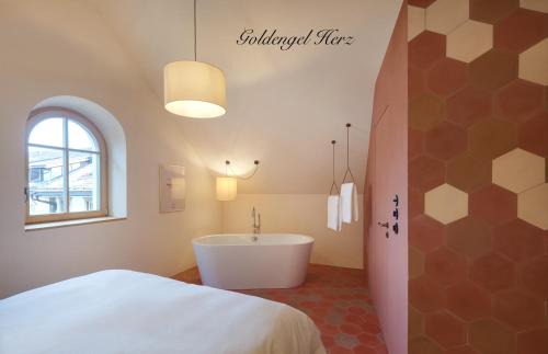 Caldaro Sulla Strada del Vino Apartment | Goldengel Design - Suiten im historischen Ortskern von Kaltern