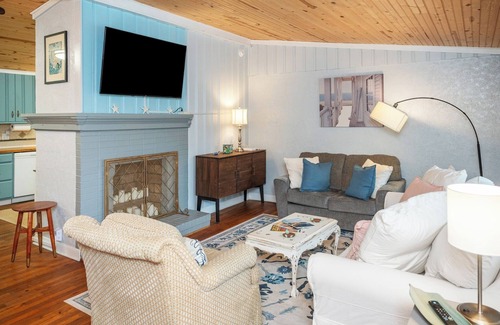 Yaupon Beach Cottage | GOLF CART Included Oak Island Cottage - Pet-friendly, Fire Pit, Porch, Sleeps 8