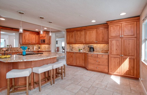 Forest Hills House | Golf Course View, Family Pool Retreat, Game Room! Near USF & Stadiums, Sleeps 14