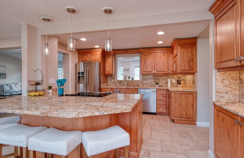 Forest Hills House | Golf Course View, Family Pool Retreat, Game Room! Near USF & Stadiums, Sleeps 14