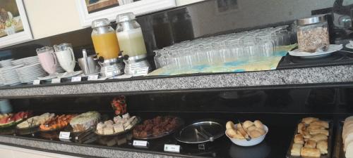 Ingleses Sul Apartment | Golfinhos Apart hotel - apto térreo na praia com café da manhã!