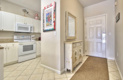 Frangista Beach Condo | Gorgeous 2 BDRM condo steps to private beach! Walk right out patio to pool