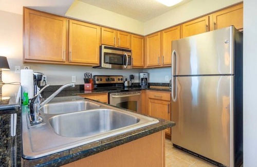 Ash Condo | Gorgeous, amazing ocean view just steps away from the beach. Covered parking.