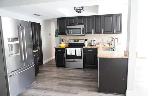 Walsingham House | Gorgeous private heated pool house, short drive to the beach!