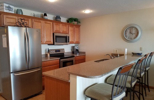 Osage Beach Condo | GREAT VIEW! Modern! Lakefront! Elevator! Very Close to Shopping & Dining! Wi-Fi