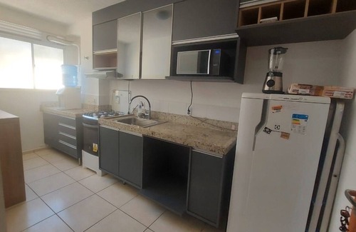 Macae Apartment | Ground floor apartment with private area and lawn