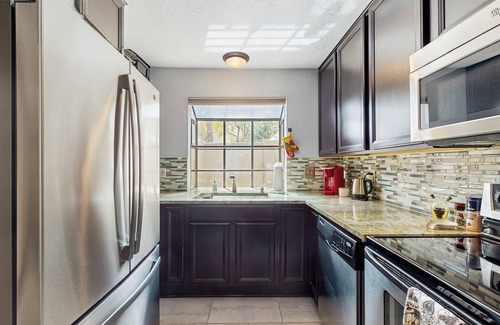 Security Acres Condo | Ground floor condo w/private patio & direct access to shared pool, dog-friendly