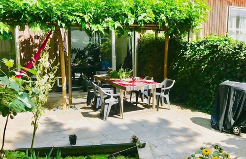 Weesperzijde Apartment | Ground level illuminated entire loft with huge garden!nDowntown area near metro