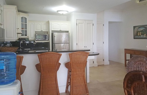 El Batey Apartment | Guest-friendly beachfront 3BD 3BTH apt, sea views, pool, near shops/restaurants