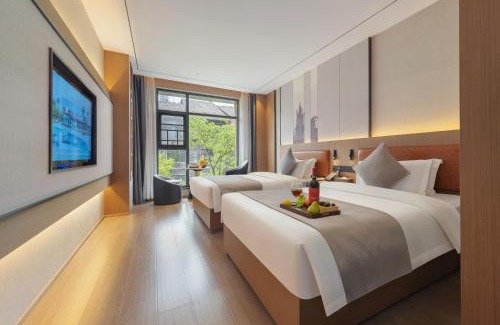 Wulingyuan Hotel | 归源臻品酒店-About 3 kilometers from the east gate of the Forest Park-advance reservation of scenic area tickets-free Chinese and Western buffet breakfast-free self-service laundry-English customer service