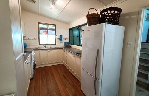 Kurrimine Beach Cottage | Gumnuts, A Coastal Bungalow, listen to the waves in Kurrimine Beach