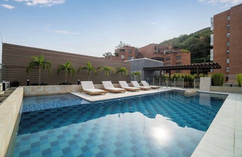 Granada Apartment | H602 - Cozy Garden View, Fast WiFi & Rooftop Pool