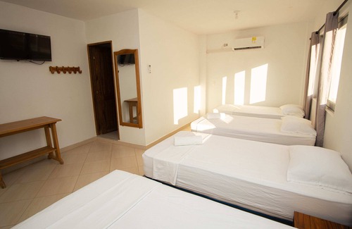 Covenas Hotel | Habitación Cuádruple Con Balcón En Coveñas Cerca A La Playa