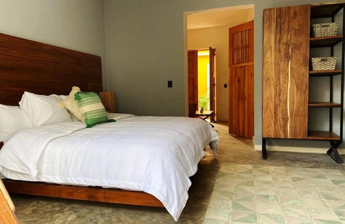 Barrio de Santiago Hotel | Habitación de lujo con king Size en el centro de Mérida.