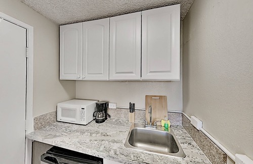 McCully - Moiliili Condo | Hawaiian Monarch 916 Condo by RedAwning