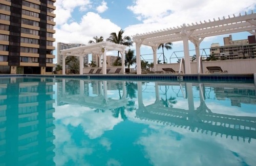 McCully - Moiliili Condo | Hawaiian Monarch 916 Condo by RedAwning