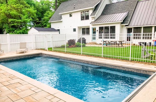 Grand Beach House | Heated pool, screened porch, fire pit, 1 blk to beach and park, close to town