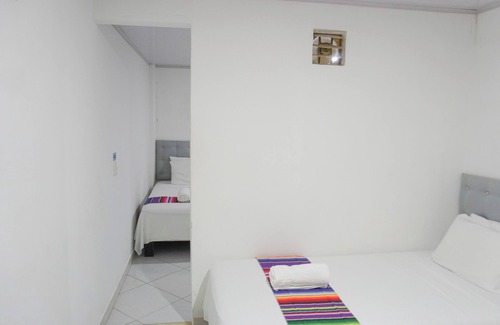 Covenas Hotel | Hermosa Habitación Básica Cuádruple A Pie De Playa