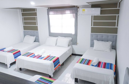 Covenas Hotel | Hermosa Habitacion Estandar Multiple A Pie De Playa