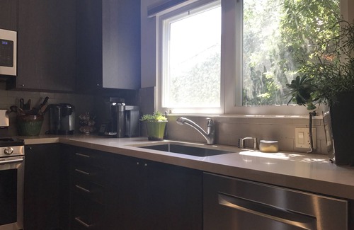 Mid-Wilshire House | Historical Mediterranean Home near Urban Lights