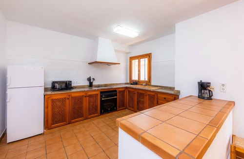 Es Pelats Apartment | Holiday Apartment 'Es Port' close to the Beach with Sea View, Terrace & Wi-Fi
