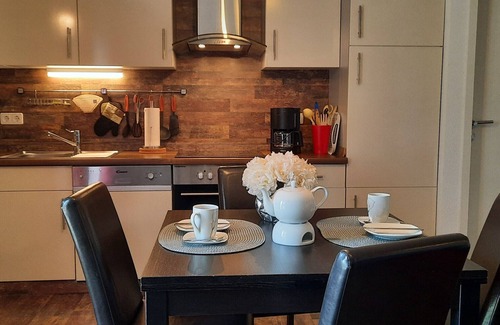 Langballig Apartment | Holiday Apartment "Wikingerland Typ 2 Obergeschoss" with Balcony, Shared Garden & Wi-Fi