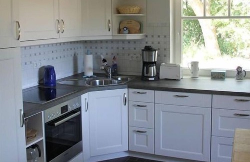 Klanxbuell Apartment | Holiday home Kapitanshaus in front of Sylt