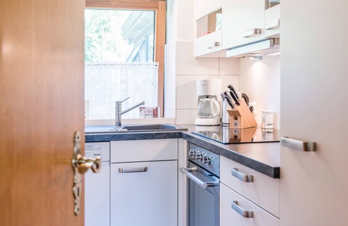 Langballigholz Other | Holiday house with sea view and sauna, fireplace & winter garden located directly on the forest