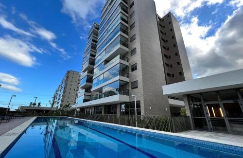 Vila Clais House | Home 49 I Apto pé na areia e piscina aquecida em Bertioga