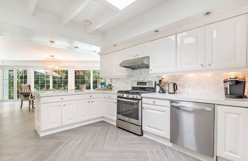 Central Beach House | Home Gem! Heated pool, lush backyard a block from the ocean on Central Beach!