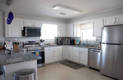 Silver Cay House | Home on water w/boat dock. 3 bed, 3 bath. Sleeps 9. Sunsets, beaches, fishing.