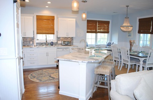 Litchfield by the Sea House | Home with 2 screen porches, 3 decks and captains deck with ocean view.