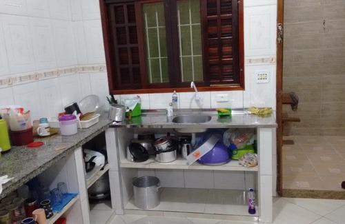 Mongagua House | Home with pool and games room, airy and comfortable, close to the beach.