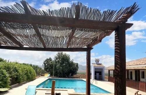 Caravaca de la Cruz House | Homerez - House with Jacuzzi and Mountain Views in Noguericas