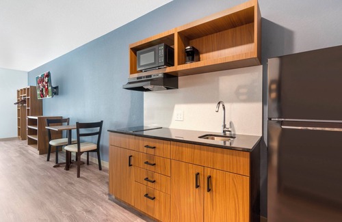 Bearss Plaza Hotel | HomeTowne Studios by Red Roof Tampa - Airport