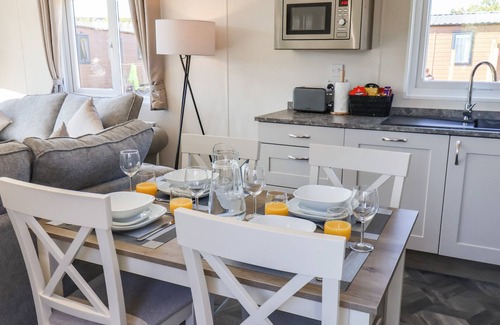 Runswick Bay Cottage | HONEYSUCKLE LODGE, pet friendly, with hot tub in Staithes