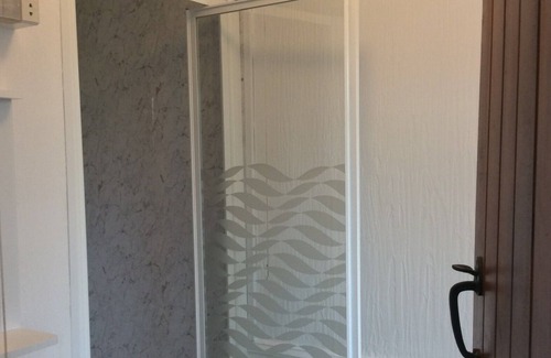 Neath Cabin | honeysuckle lodge 1 bed nestled in woodland area