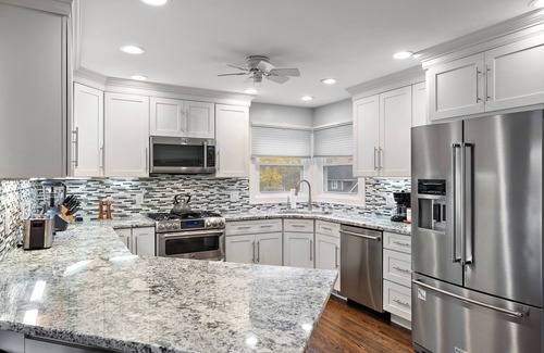 Plymouth House | Hot Tub after winter fun! Game Room, Huge Primary Suite with Spa like Bathroom