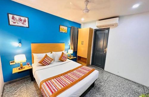 Punjabibagh Hotel | Hotel Golden Saffron By Qotel Punjabi Bagh