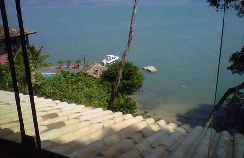 Mambucaba House | House 3 suites Praia Particular on Ilha do Araujo, overlooking Paraty