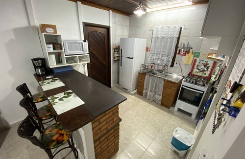 Cananeia House | House in Cananéia with swimming pool and barbecue area