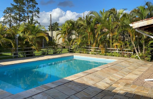 Cananeia House | House in Cananéia with swimming pool and barbecue area