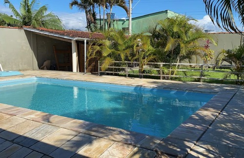 Cananeia House | House in Cananéia with swimming pool and barbecue area