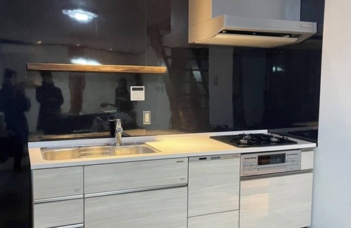 Sennan District House | House overlooking the sea from the top of a hill