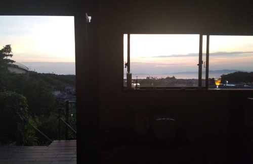 Sennan District House | House overlooking the sea from the top of a hill