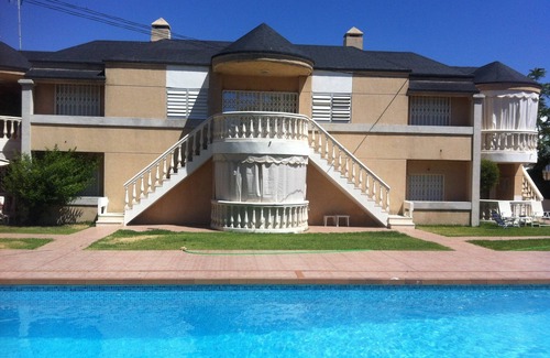 Punta Umbria Apartment | House with garden and pool a few steps from the sea