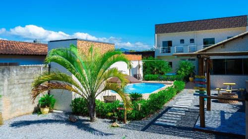 Cidade Nova Peruibe House | House with Swimming Pool and Barbecue area in Peruíbe with lots of comfort for 16 people
