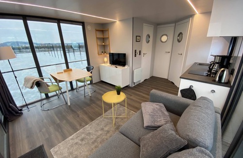 Schleswig Boat Rental | Houseboat Fjord Serina with bio-sauna and roof terrace in Schleswig